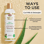 Bottle of African Pride Curl Milk & Detangler with aloe vera leaf on a beige background
