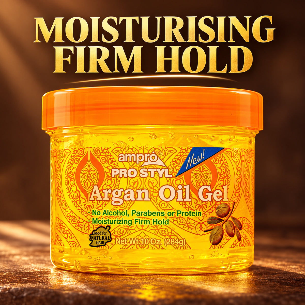 A jar of ampro Pro Styl Argan Oil Gel with an orange lid and golden-yellow gel visible through the clear container, set against a dark brown background with large gold text reading 'MOISTURISING FIRM HOLD'.