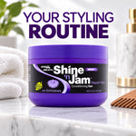 A tub of Ampoa Shine 'n Jam Regular Hold Conditioning Gel sits on a marble countertop with a white towel and gold-toned bottle in the background. Large purple text at the top reads 'YOUR STYLING ROUTINE'.