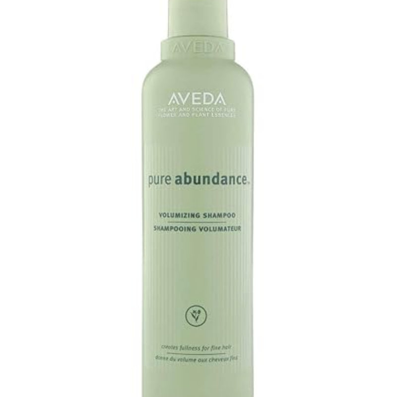 Aveda pure abundance volumizing shampoo bottle on a white background