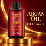 A bottle of Creme Nature Argan Oil Oil Treatment stands on a gold pedestal against a dark red and gold background. The bottle is dark amber with a black cap and a red label featuring gold text and an argan illustration.