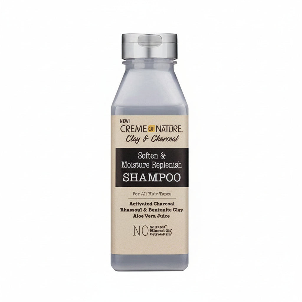 Shampoo bottle with 'Creme of Nature' label on a white background