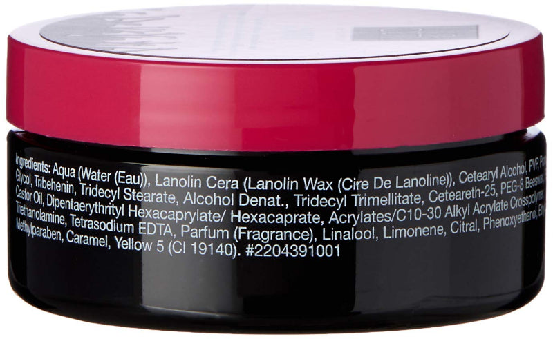 Back view of a cosmetic jar with a red lid and black body, showing ingredients list.