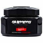 A black plastic jar of Gummy Professional Hairgel Maximum Hold Extreme Look, featuring a black lid and a black label with white and red text, on a white background.