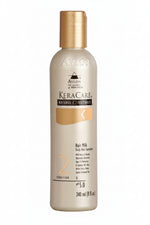 Avlon KeraCare hair milk bottle on a white background