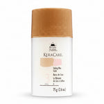 KeraCare styling wax stick with brown cap on white background