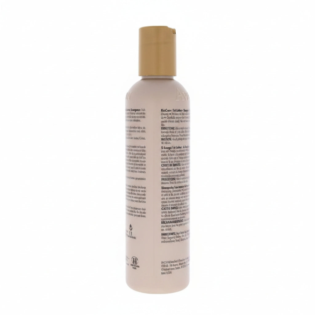 Shampoo bottle with beige cap on a white background