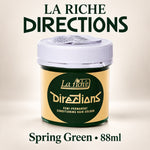 A jar of La Riche Directions semi-permanent conditioning hair colour in the shade Spring Green, 88ml. The product is shown in a cylindrical jar with a white lid and a label that is primarily yellow with a dark green oval logo.