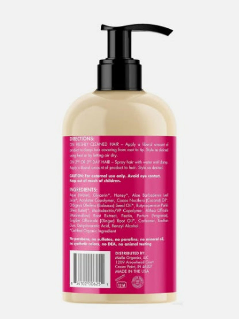 Lotion bottle with pump and pink label on a white background