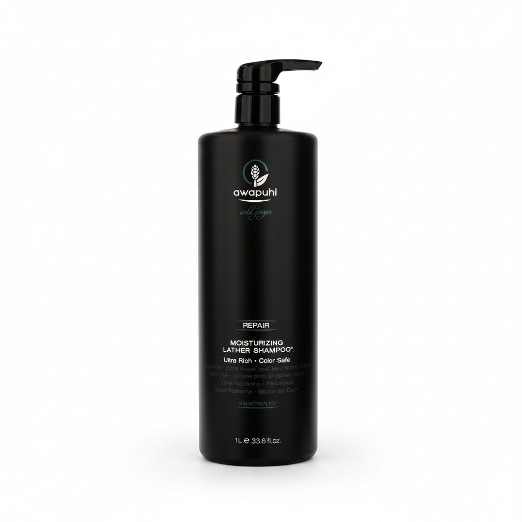 Black shampoo bottle with pump labeled 'awapuhi' on a white background