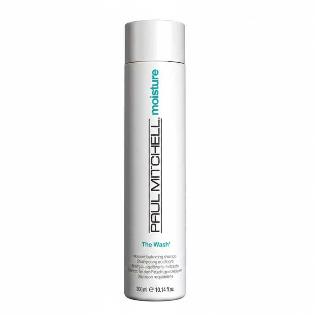 Shampoo bottle labeled 'Paul Mitchell The Wash' on a white background