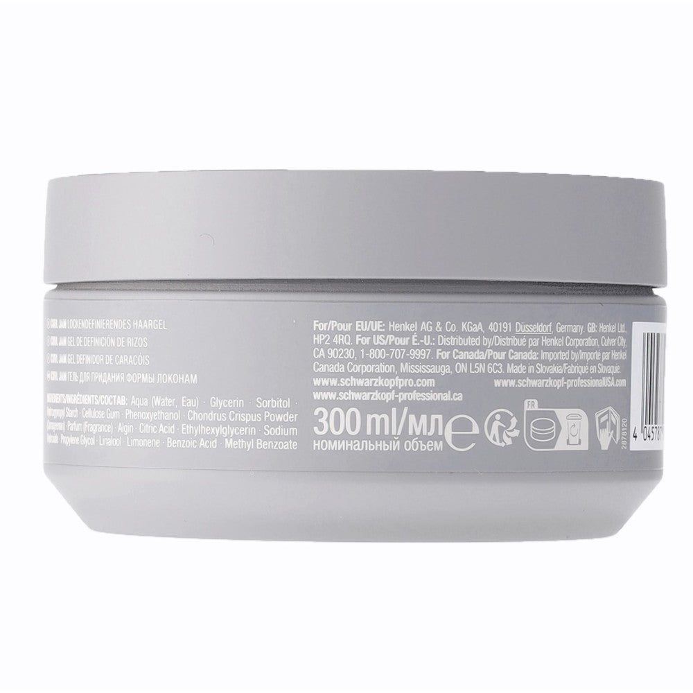 Back view of a gray hair product container with label details on a white background