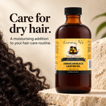 A bottle of Sunny Isle Jamaican Black Castor Oil placed on a stone surface next to curly dark hair, with promotional text on the left.