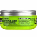 Green hair product jar with silver lid on a white background