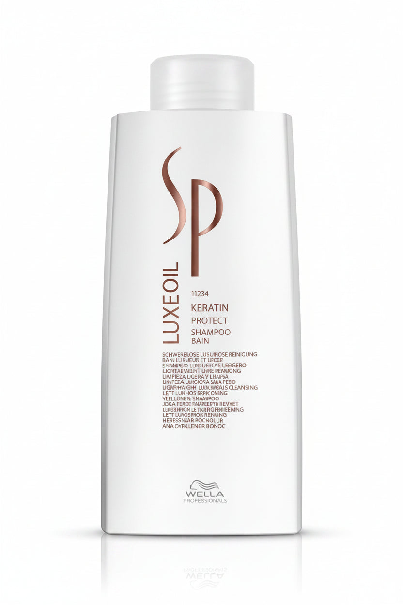 Wella SP LuxeOil Keratin Protect shampoo bottle on a white background