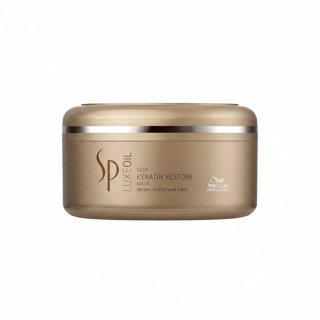 SP LuxeOil Keratin Restore Mask container with Wella Professionals logo on a white background