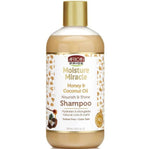 African Pride Moisture Miracle Honey & Coconut Oil Shampoo bottle on a white background