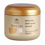 Keracare hair product jar with gold lid on a white background